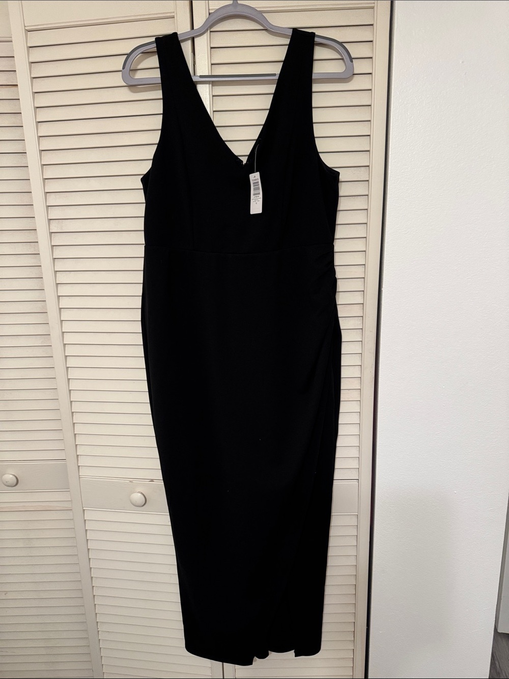 torrid Black Dress – V-Neck, high slit and tight dress under to show some leg!